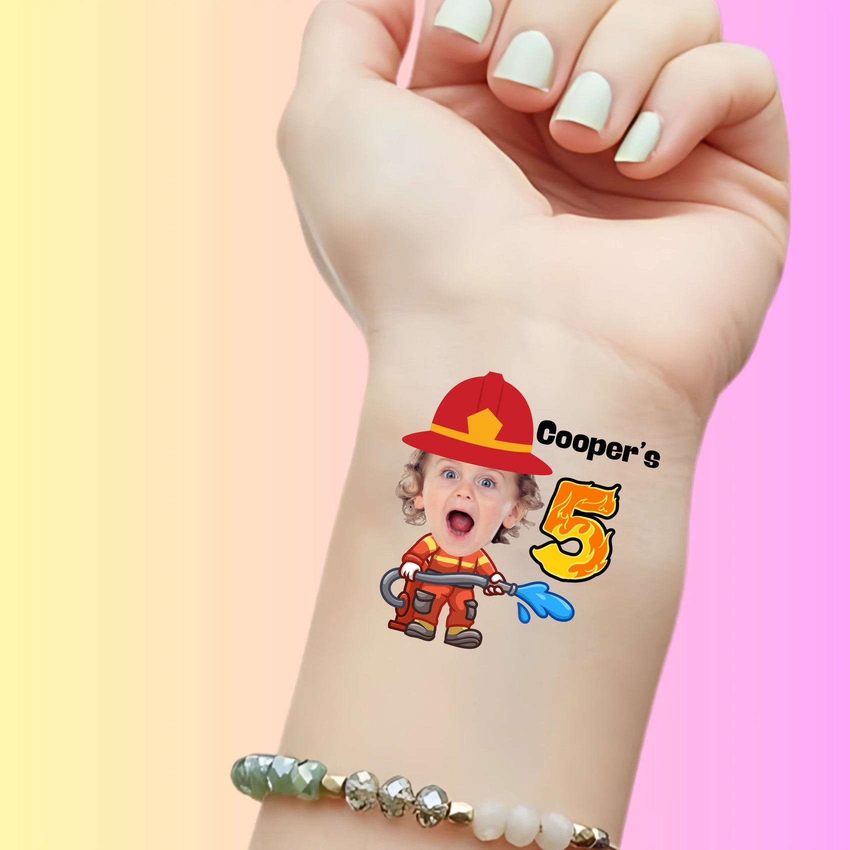 custom temporary tattoo of a child's face as a firefighter with a water hose, firefighter hat, and 'Cooper's 5' for birthday favor