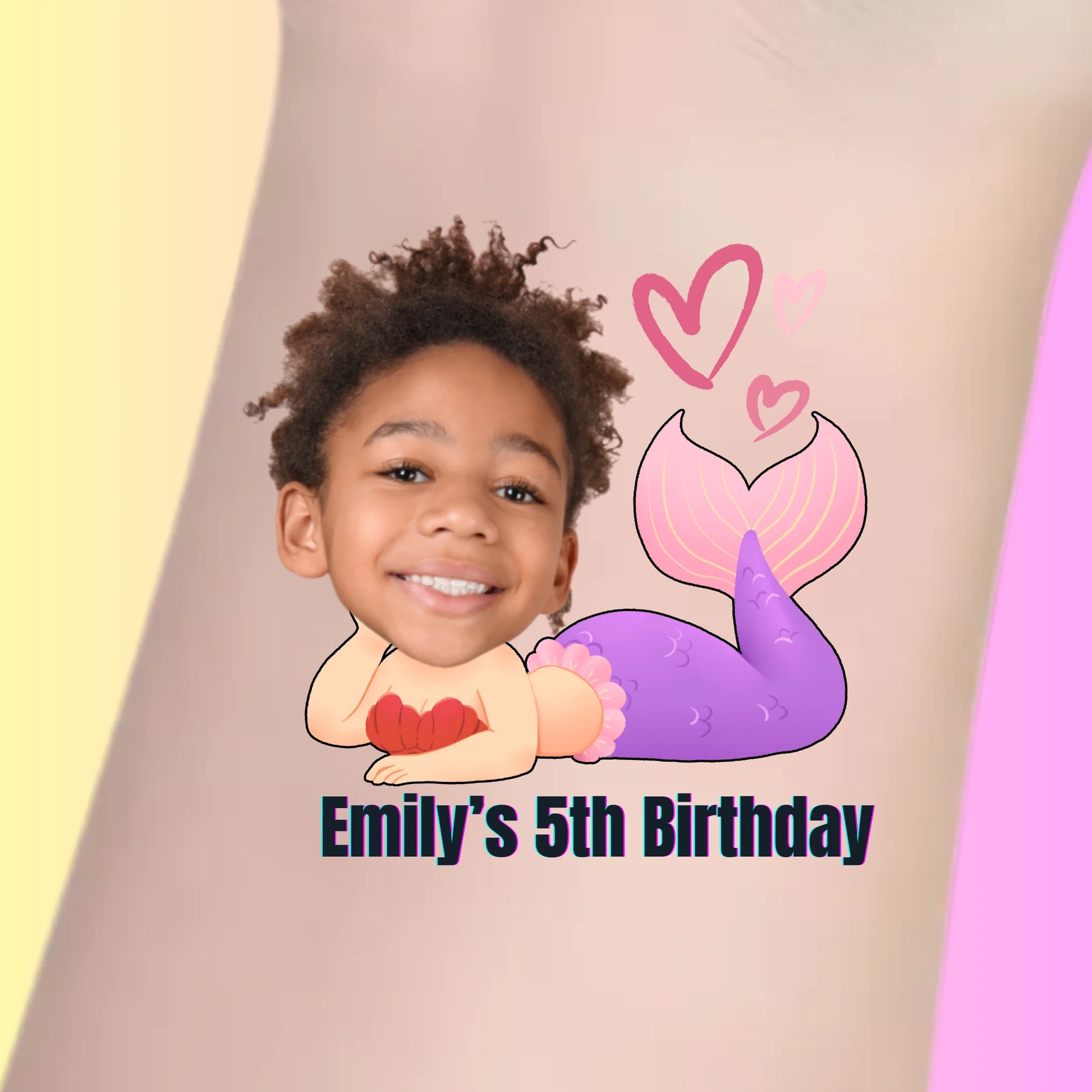 Custom temporary tattoo of a smiling child as a mermaid with pink hearts and text Emily's 5th Birthday