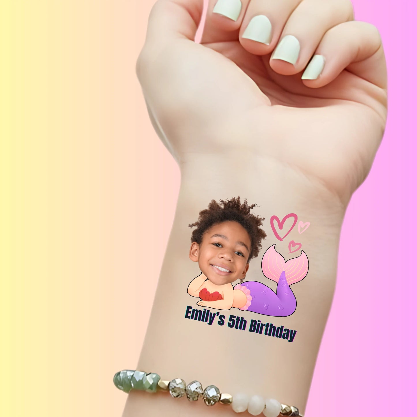 Custom temporary tattoo of a child's face on a purple mermaid body with hearts, personalized party favor for Emily's 5th birthday