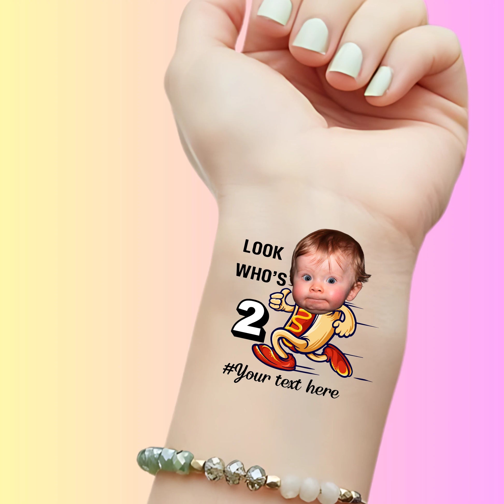 Custom temporary tattoo on wrist with running hot dog cartoon and personalized baby's face for 2nd birthday party favor