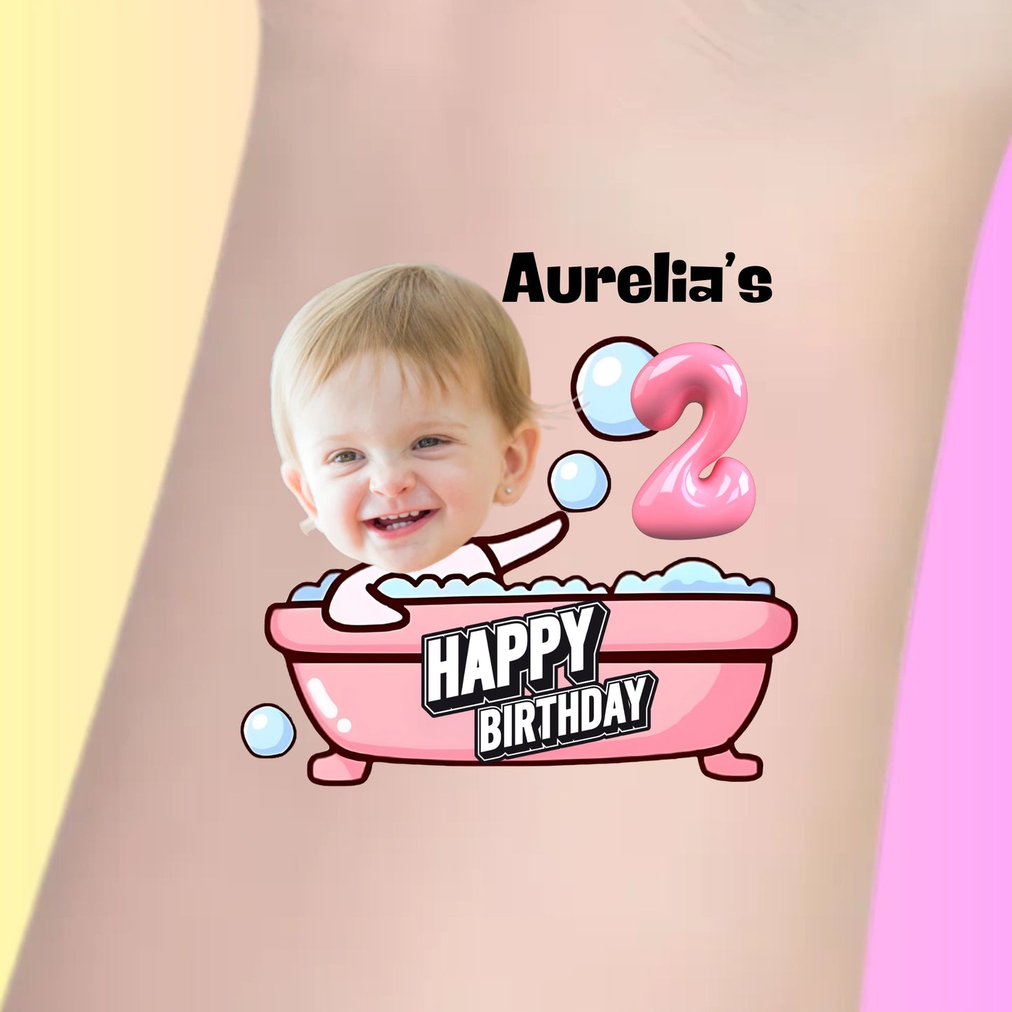 Custom temporary tattoo with baby face in pink bathtub, bubbles, number 2, and happy birthday text for personalized party favor