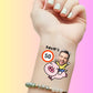 Custom temporary tattoo on wrist featuring a smiling man riding a cartoon pig with 'David's 50' text, personalized party favor