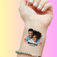 Custom temporary tattoo on wrist featuring photo of smiling couple and text Married Jack & Mia, personalized party favor for weddings