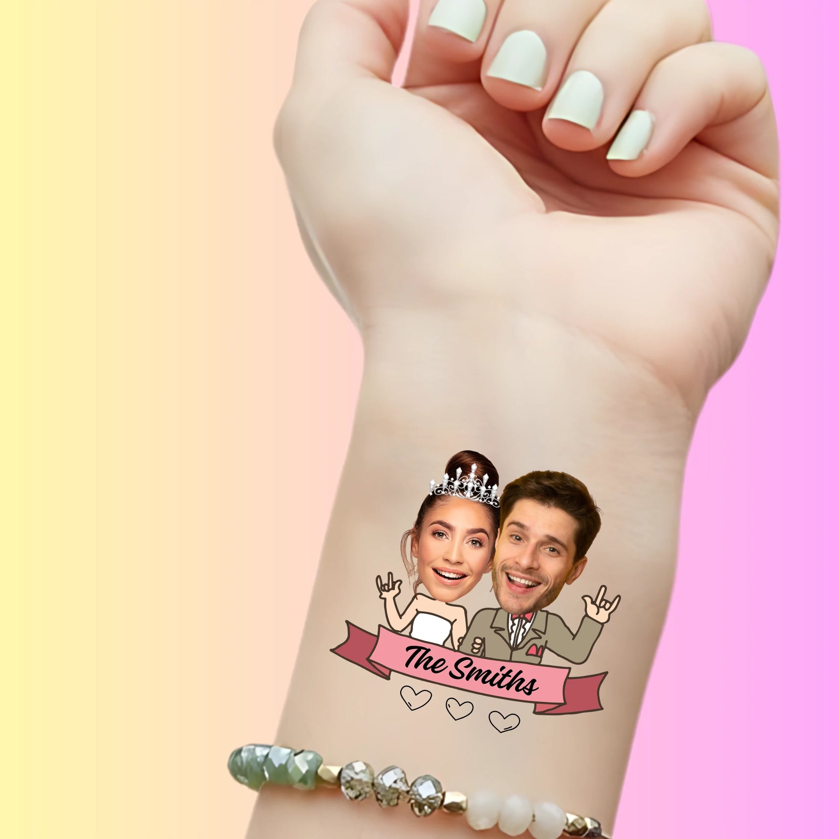 custom temporary tattoo on wrist of bride and groom faces with 'The Smiths' banner, personalized party favor for wedding