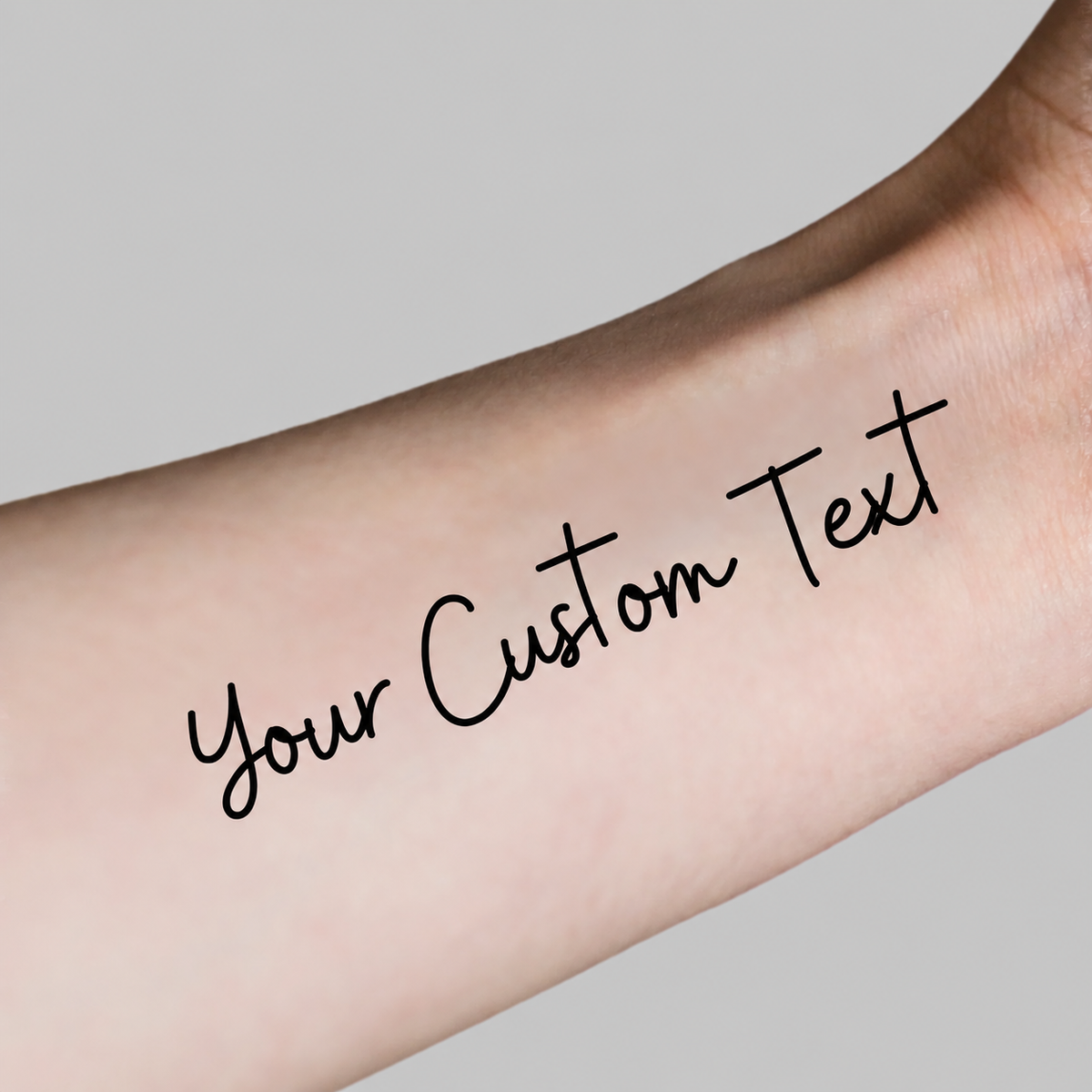 Text custom temporary tattoo — arm view